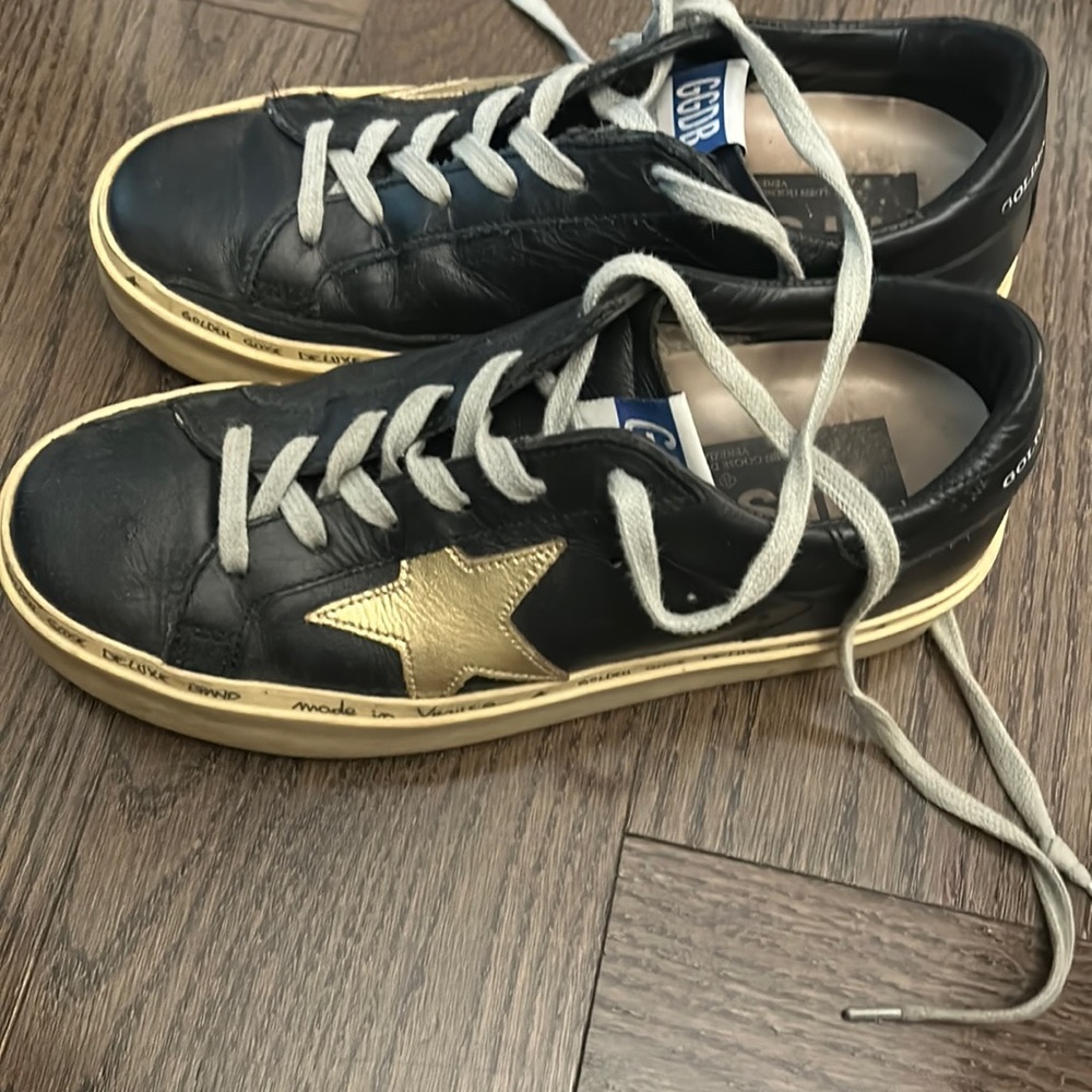 Golden goose Hi star black sneakers with gold star